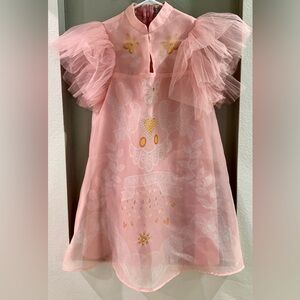 Make your own way hand made in Vietnam dress.